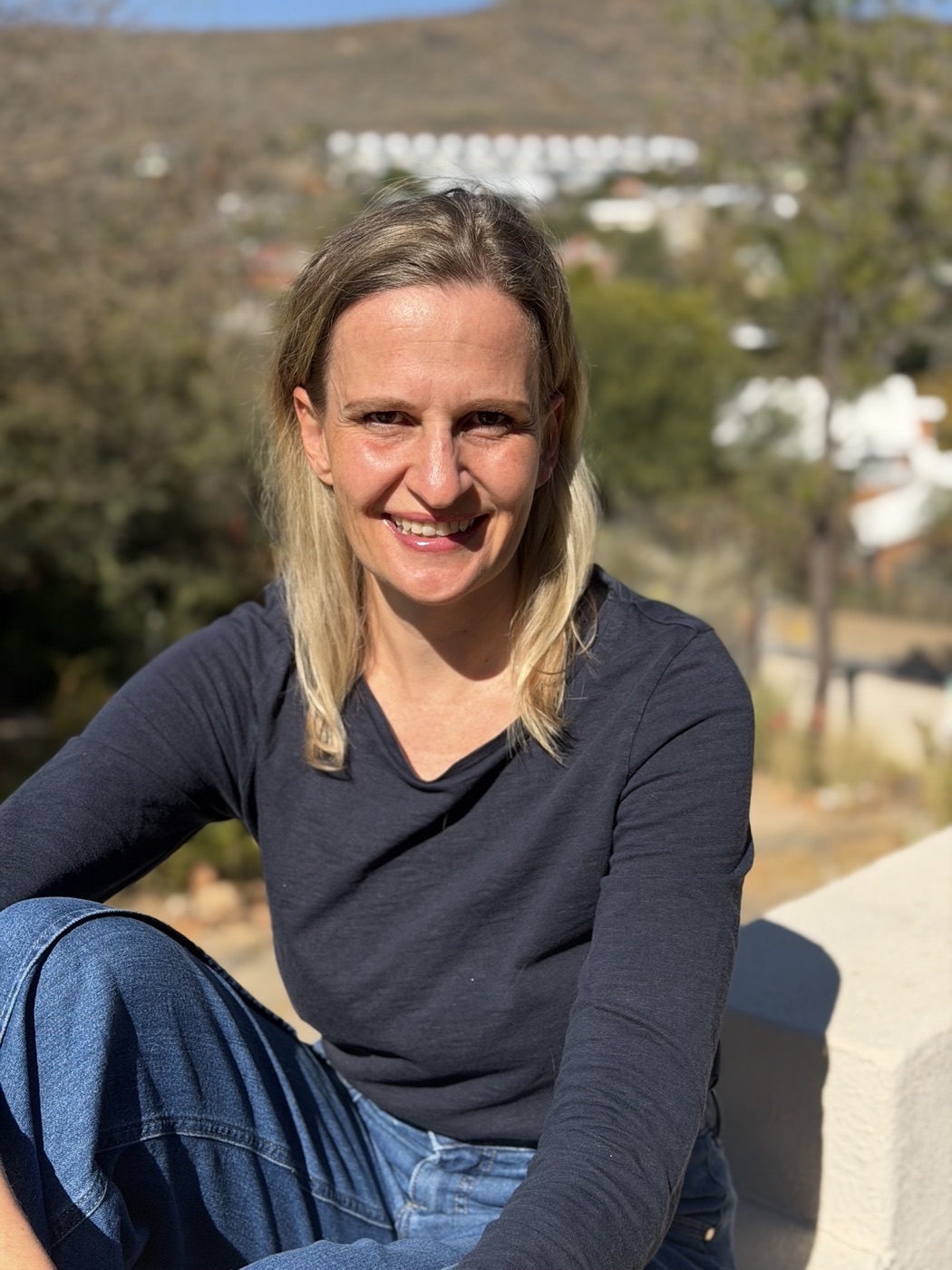 Portrait of Elke Diehl smiling outdoors in Namibia